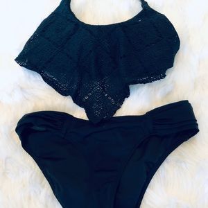 Black bathing suit top and bottom included